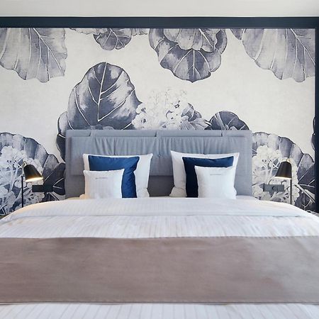 ホテル ダス テーゲルンゼー テガーンゼー エクステリア 写真 A bedroom at the hotel