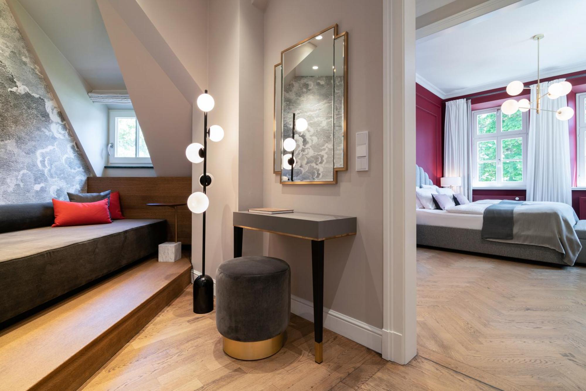 ホテル ダス テーゲルンゼー テガーンゼー エクステリア 写真 A suite at the Hotel Axelmannstein